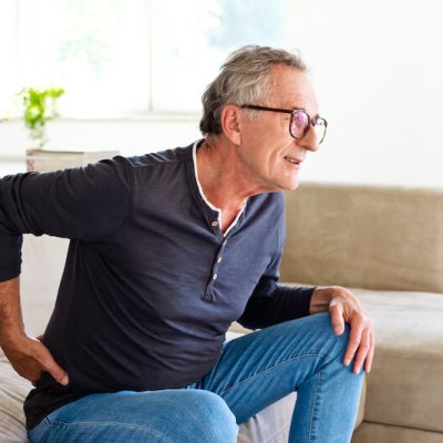 Senior man suffering backache