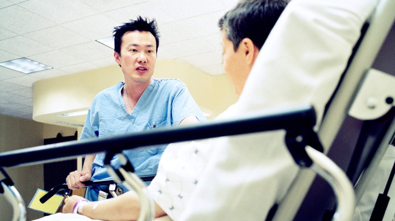 Surgeon Speaking with Patient Prior to Surgery