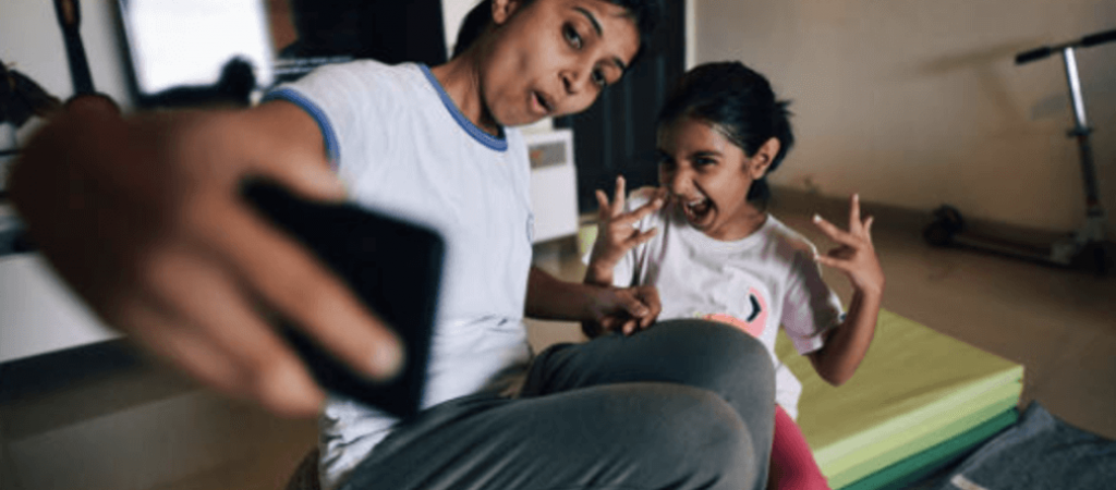 Mom and Daughter Selfie Image of a mother and her daughter taking a selfie